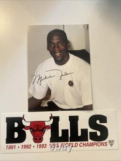 Michael Jordan Autographed Picture & 3 Peat Champions Sticker