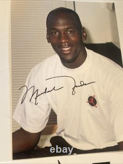Michael Jordan Autographed Picture & 3 Peat Champions Sticker