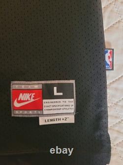 Nike's Vintage Michael Jordan #23 Bulls Jersey Size L +2 Inches. Excellent Cond