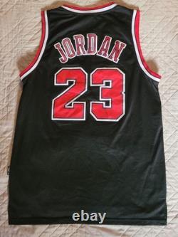 Nike's Vintage Michael Jordan #23 Bulls Jersey Size L +2 Inches. Excellent Cond