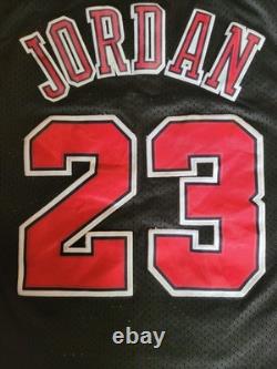 Nike's Vintage Michael Jordan #23 Bulls Jersey Size L +2 Inches. Excellent Cond